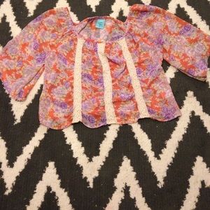 Floral blouse with lace.