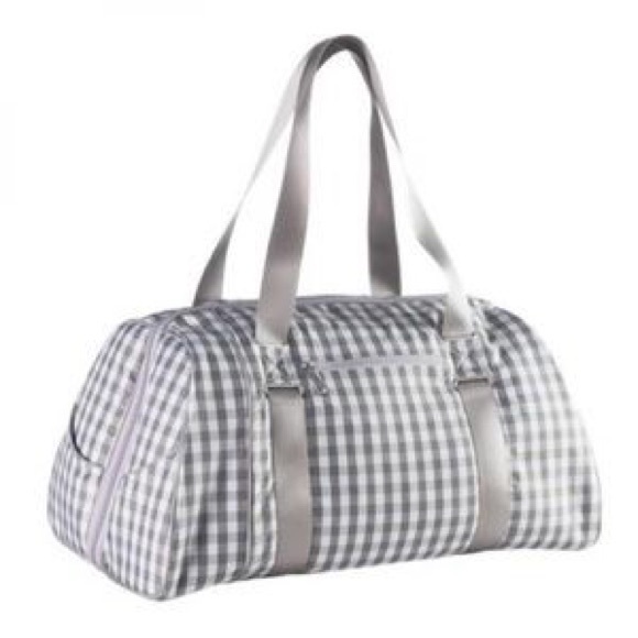 Nike duffle gym bag. Includes a small hand bag.