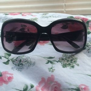 Black rimmed sunglasses