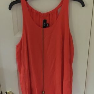 Orange sleeveless top