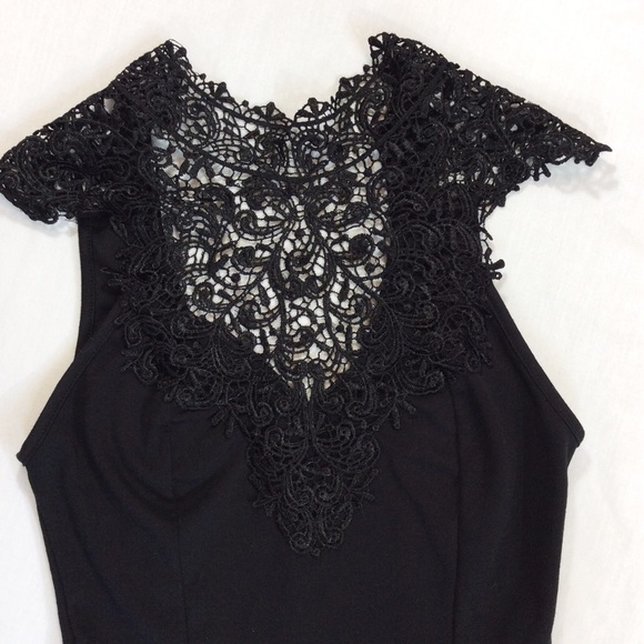 Black,  Lace Neck,  Peplum Top. - Picture 2 of 4