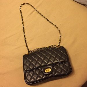 Black quilted jumbo shoulder bag