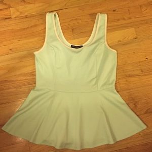 Mint green peplum top size L