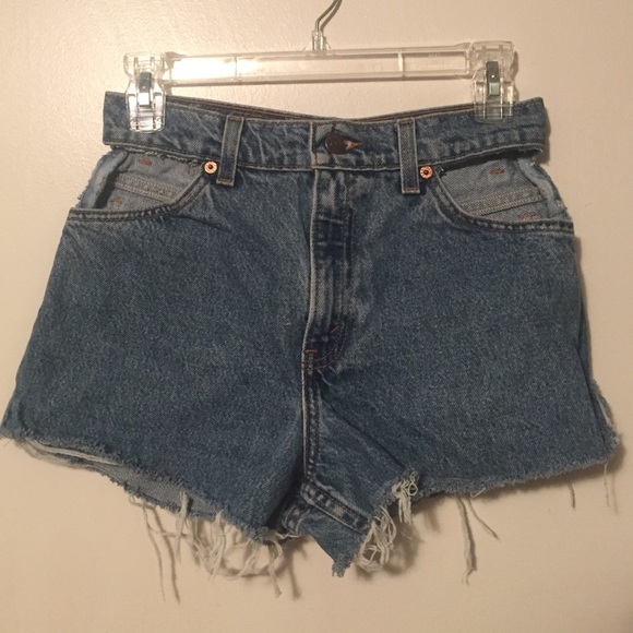 Levi high-waisted shorts w/ cut-out pocket detail.
