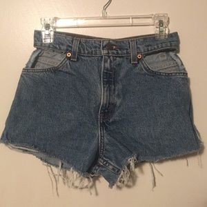 Levi high-waisted shorts w/ cut-out pocket detail.