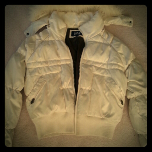 Cream colored winter coat.