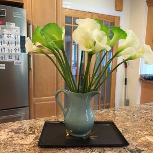 Pitcher with flowers