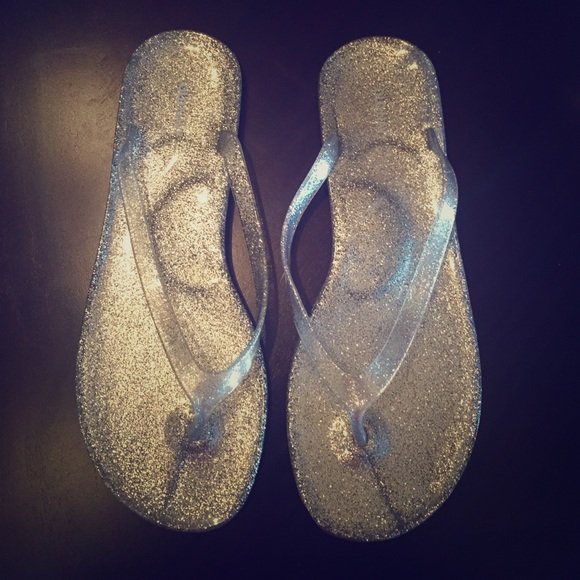 Silver sparkle jelly flip flops