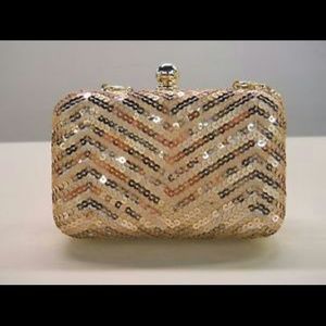 Gold sequin clutch