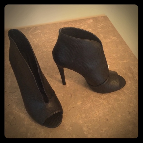 Very sexy black peep toe bootie.