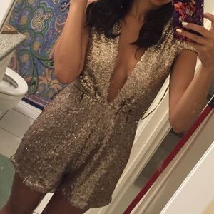 Gold romper with plunging neckline