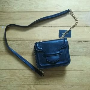 Tradeee.  Black side sling mini purse.