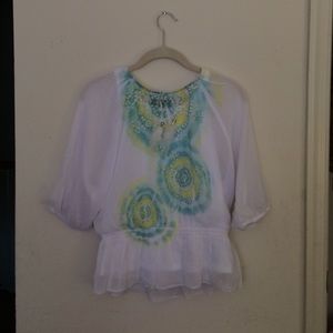 a white and pastel top