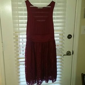 Rust/red cocktail length lace bottom dress