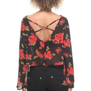 Black floral crop top with long flair sleeves