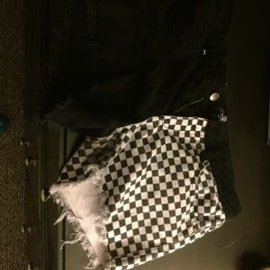 Half black half black and white checkered shorts