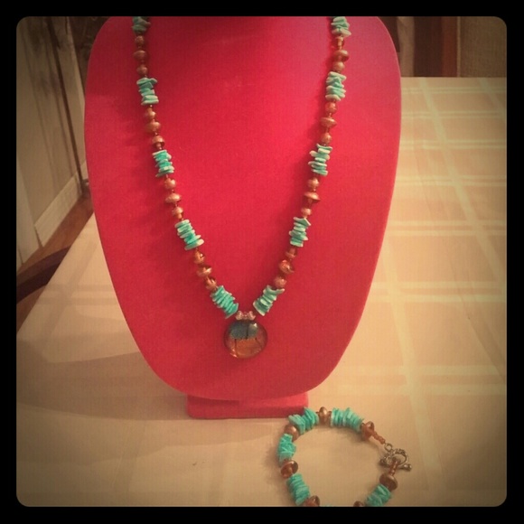 Necklace with matching bracelet and earings