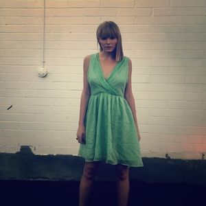 Green cross front chiffon dress