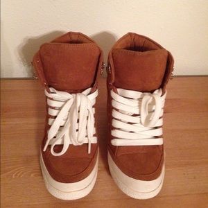A cool brown sneaker , brand new