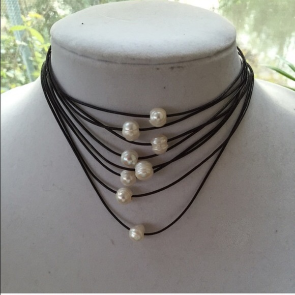 1 fresh water pearl and leather necklace