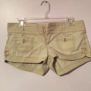 Light tan shorts.