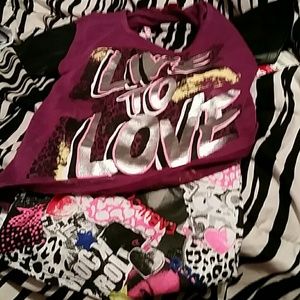 Stylish purple shirt with shiny decal on front