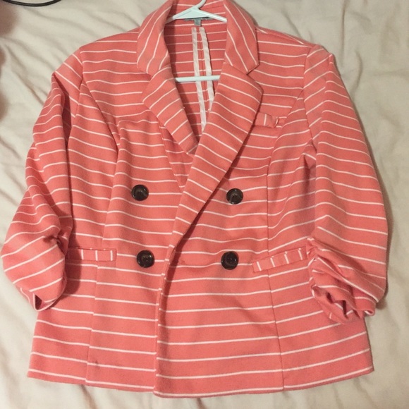 Coral/white striped blazer.