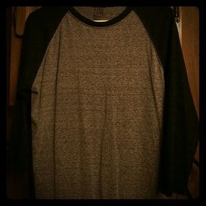 Gray and black baseball T-shirt.
