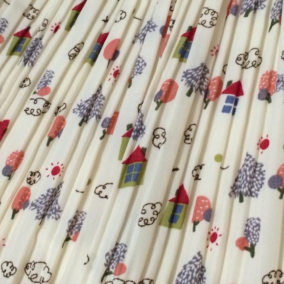 🚫SOLD🚫 Whimsical printed cream pleated skirt - Picture 2 of 2