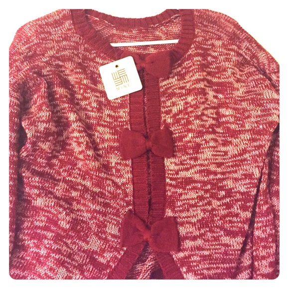 Crew neck sweater with bow tie back