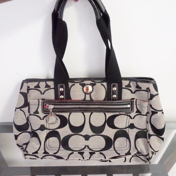 Coach purse with pink interior