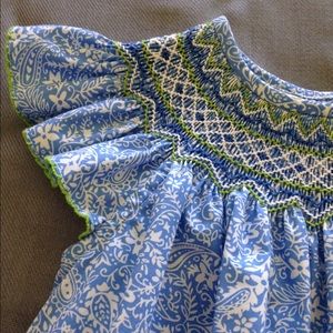 Girl's Floral dress with hand smocking.