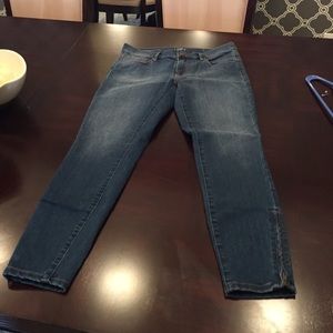 Ankle cut skinny jeans with zippers on ankles