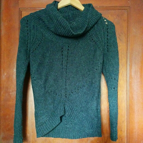 wide-neck turtleneck with unique bottom cut
