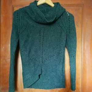 wide-neck turtleneck with unique bottom cut