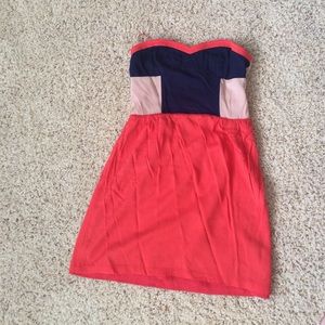 Orange and navy color block strapless dress