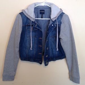 Jean vest with sweatshirt sleeves.