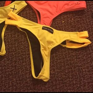 Yellow double strap bottoms and navy top on hold