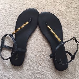 Black and gold sandals