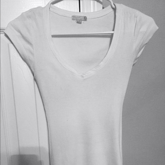 Go to sexy white vneck with embellishment
