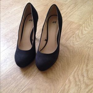 Black suede pumps