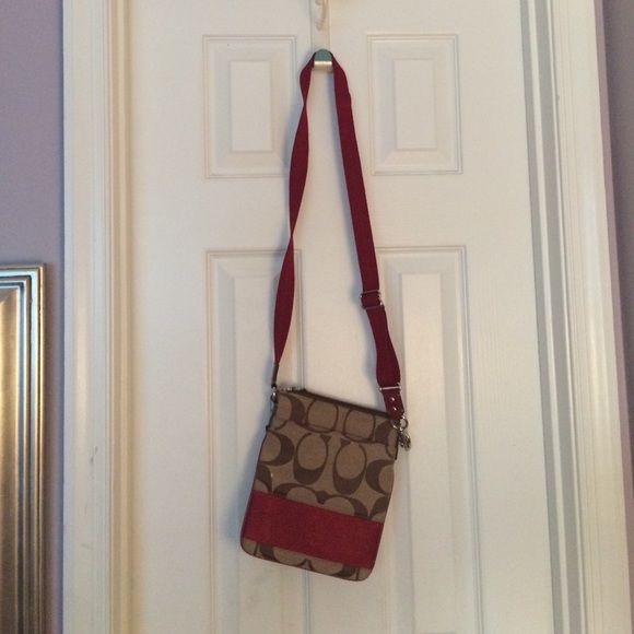Red and brown coach crossbody bag