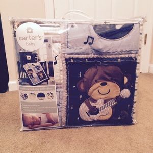 Cute little boys crib set. From Carters.
