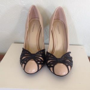 Nude and black pin up heels