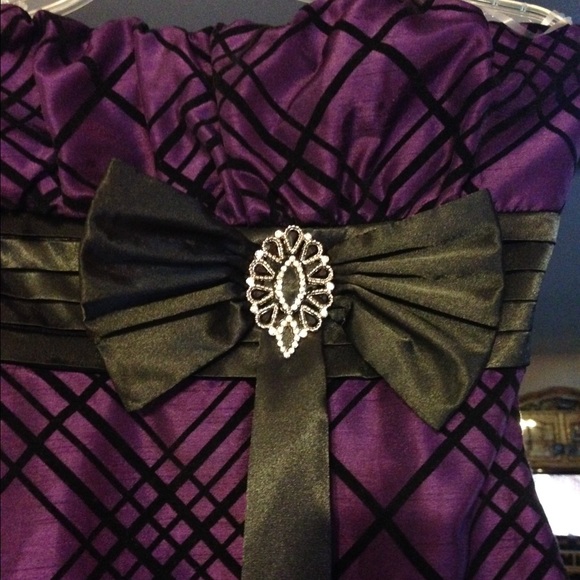 Plaid patterned purple dress with ribbon detail