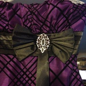Plaid patterned purple dress with ribbon detail