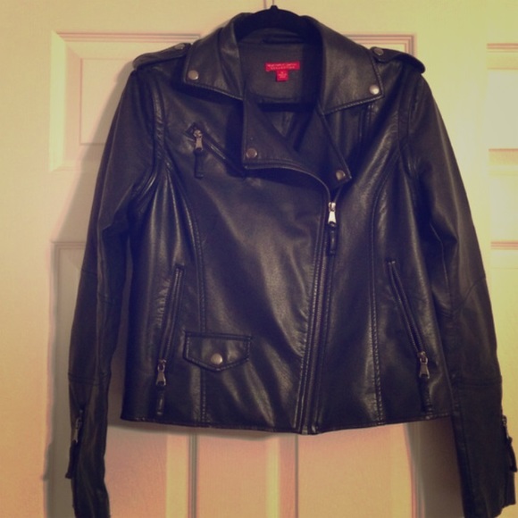 Black faux leather vest with attachable sleeves