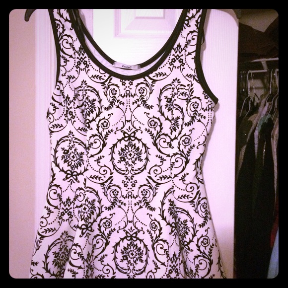 Never worn but without tags. Peplum top