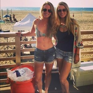 Free people jean shorts with lace trim