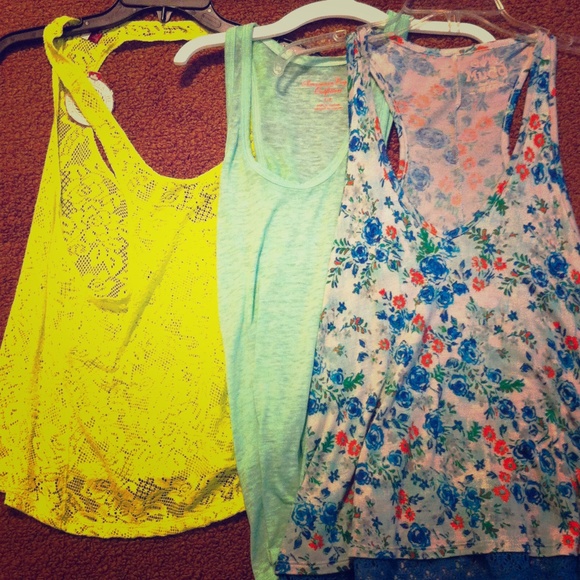 3 tank tops. One MUDD brand, one AMERICAN EAGLE...